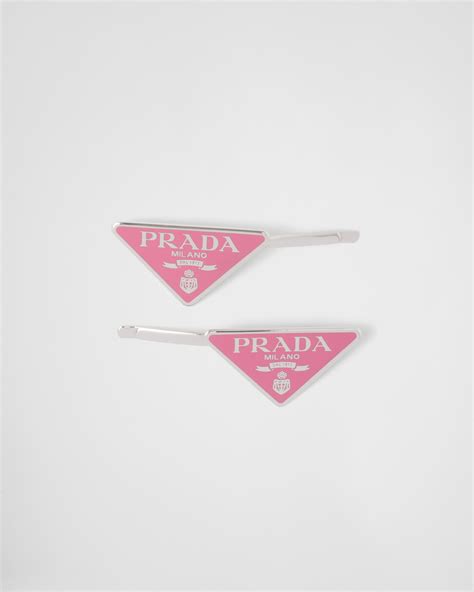 pink prada hair clip.